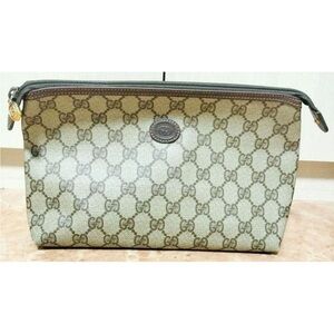 Gucci Tan and Brown Monogram Clutch